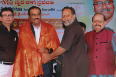 Dr.  AVK being honoured at a music event