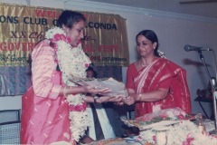 Mrs. Krishna Kumari being felicitated at the Lions Club Golconda event