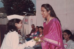 Mrs. Krishna Kumari sharing a pleasant moment with an awardee